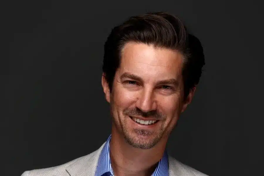 Justin Baer Leads a Bold Shift in Modern Money Reporting